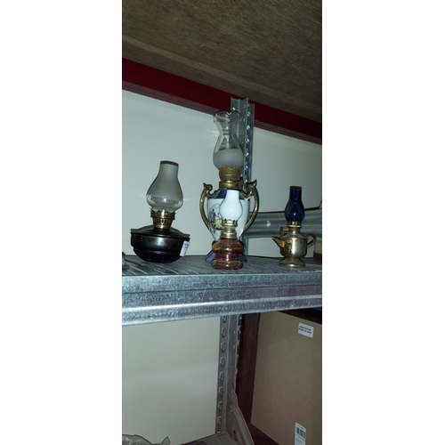 136 - 4 Small Oil Lamps