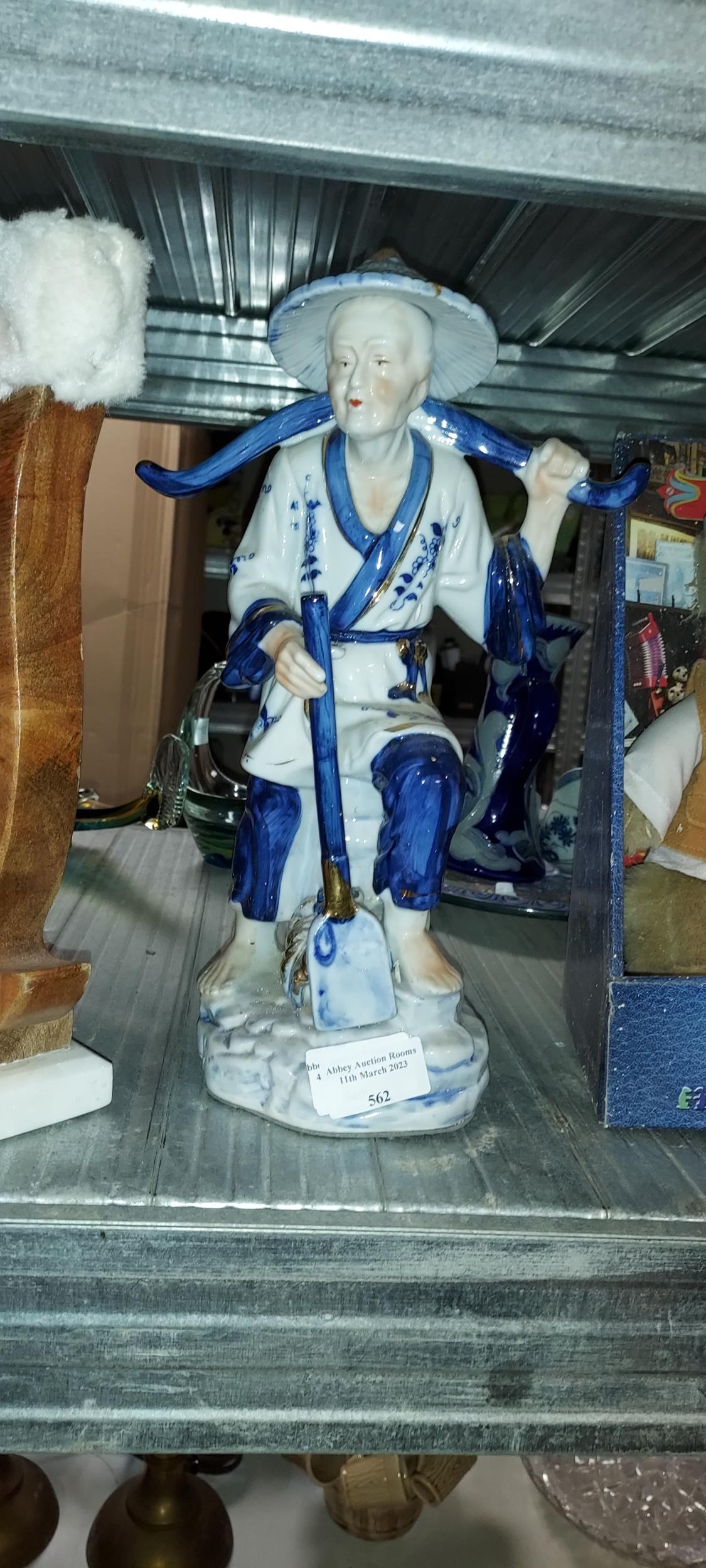 Porcelain Chinese Man Figurine