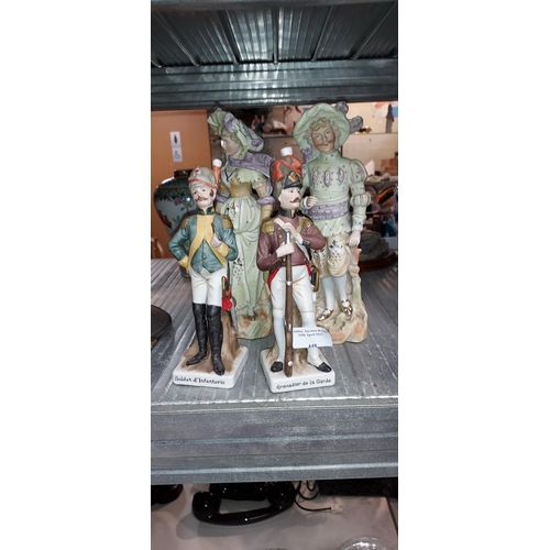 448 - 2 Soldier Figurines Plus Matching Couple Figures