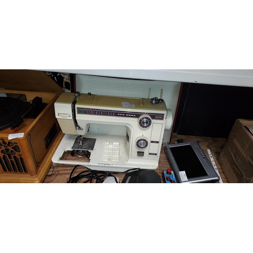 648 - Toyota Electric Sewing Machine With Foot Pedal And Lead