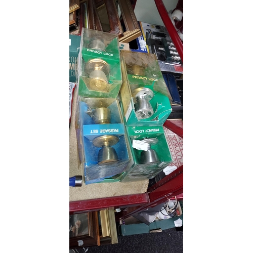 168 - 9 Chrome And Brass Door Handles In Boxes