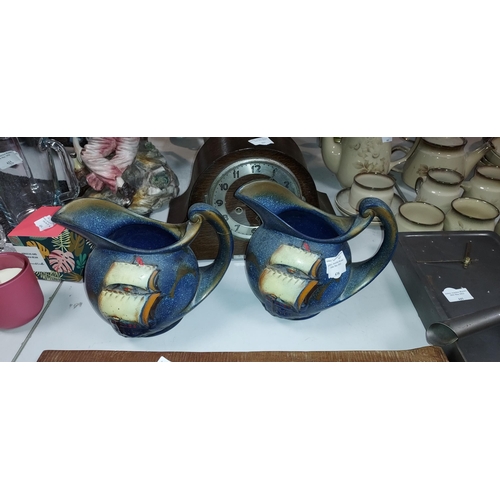 438 - 2 Blue Patterned Jugs One With Broken Handle