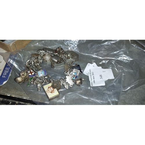 348 - Silver Charm Bracelet With Lots Of Charms Weights Approx. 101.7Gms