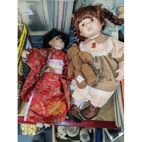 642 - 4 Porcelain Dolls