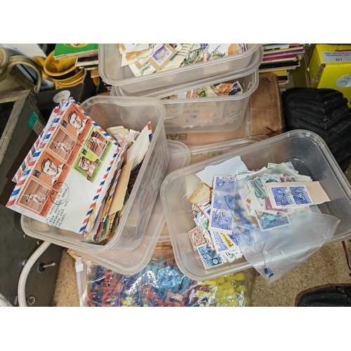 217 - World Stamps In 8 Plastic Trays