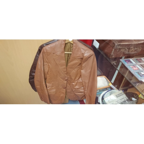 23 - 3 Leather Jackets 2 Brown 1 Black 1 Brown Has A Rip