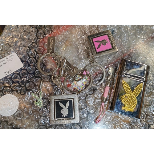 298 - Selection Of Playboy Keyrings And Lighter