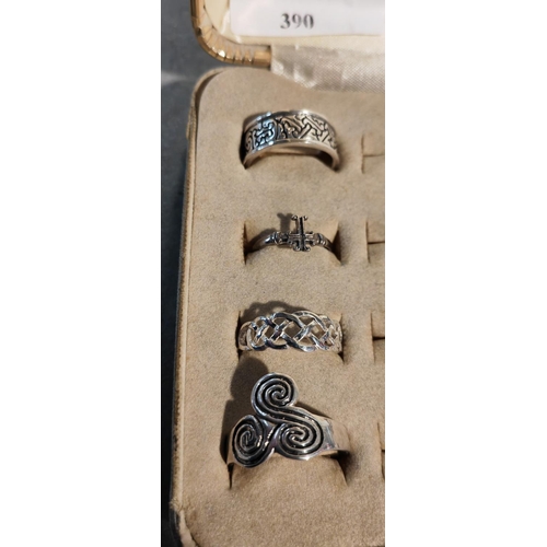 390 - 4 Mixed Silver Rings