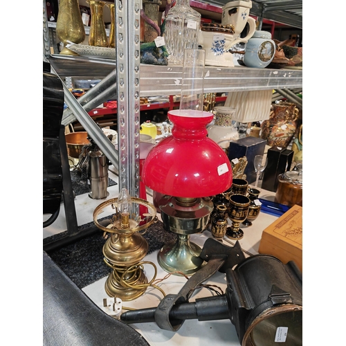 485 - Oil Lamp With Red Glass Shade Plus A Converted Oil Lamp Base