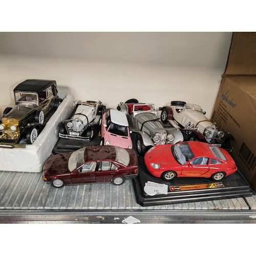 133 - 6 Diecast Cars Plus A Car Shaped Radio