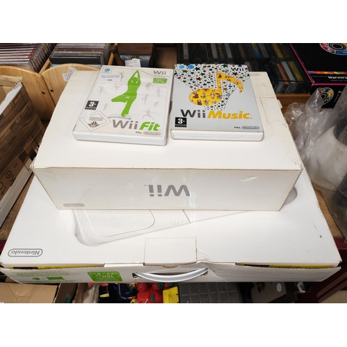 166 - Wii Console With Wii Fit Board And Some Games All Boxed
