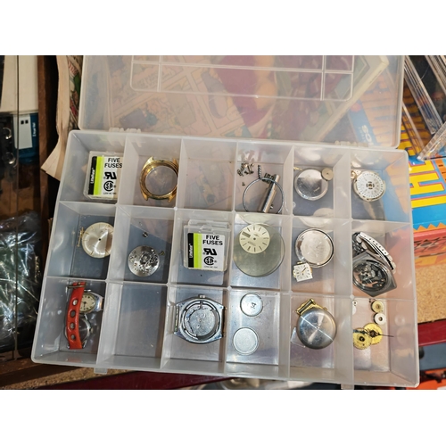 243 - 4 Cases Of Clock Parts Etc