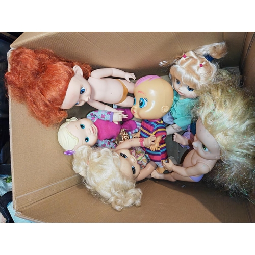 142 - Box Of Wide Eyed Dolls