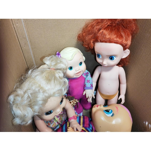 142 - Box Of Wide Eyed Dolls