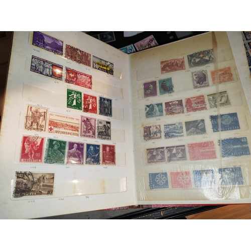 549 - Swiss Stock Album With World Stamps