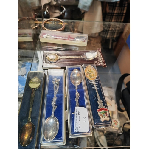 279 - 6 Souvenier Spoons In Cases Plus A Bangle