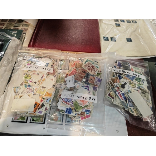 566 - 3 Bags Of World Stamps