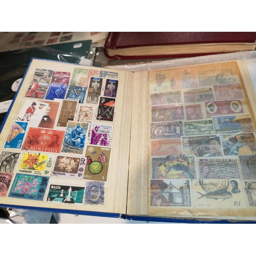 578 - 4 Stock books Mixed World Stamps