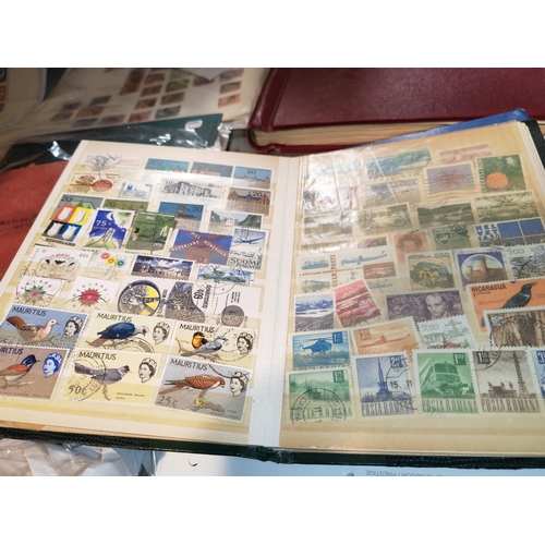 578 - 4 Stock books Mixed World Stamps