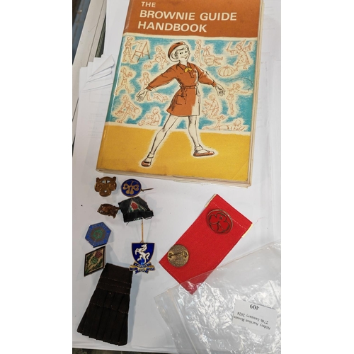 409 - Selection Of Brownie And Girl Guide Badges Plus A Brownie Guide Hand Book