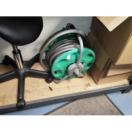 66 - Garden Hose On Reel