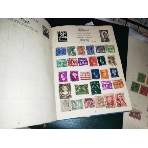 569 - Four Stamp Albums With Some Stamps With Some Loose Stamps