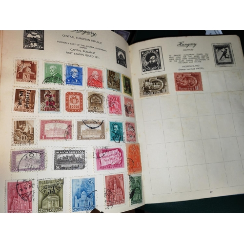 569 - Four Stamp Albums With Some Stamps With Some Loose Stamps