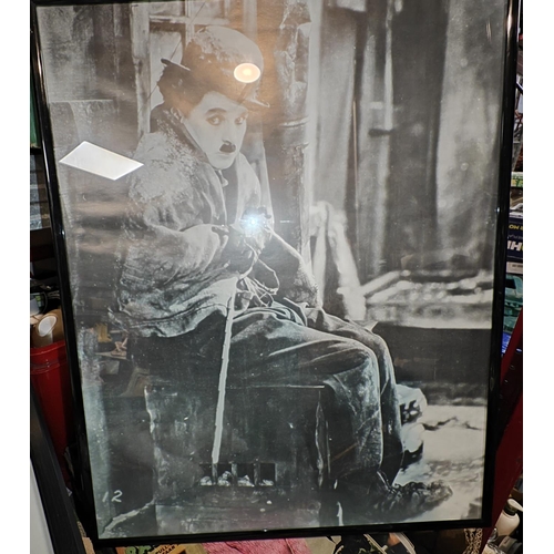 637 - Framed Print Of Charlie Chaplin And A Photograph Print Of Laurel And Hardy