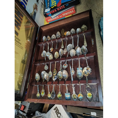 663 - 2 Display Cabinets Of Souvenier Spoons