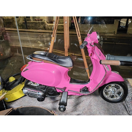 39 - Childs Ride On Vespa Scooter With Charger Charged But Not Working