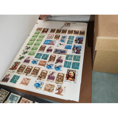 532 - Box Of Stamps And An Album Of Stanley Gibbon Album With A Few Stamps Inside