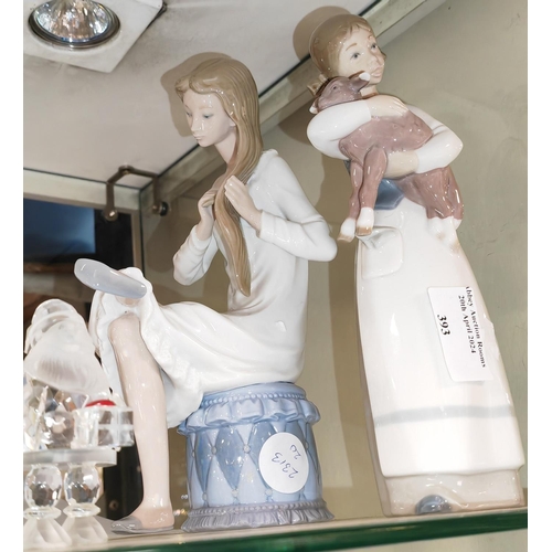 393 - Nao Girl Combing Hair + Lladro Girl Holding Lamb