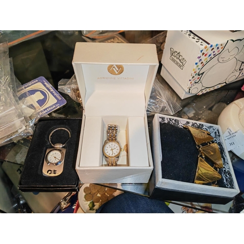 302 - 2 Ladies Watches Plus A Key Fob In Boxes