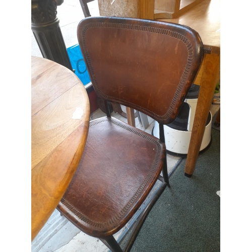 46 - Table With 2 Leatherette Bound Chairs Shrinkage To The Table Top