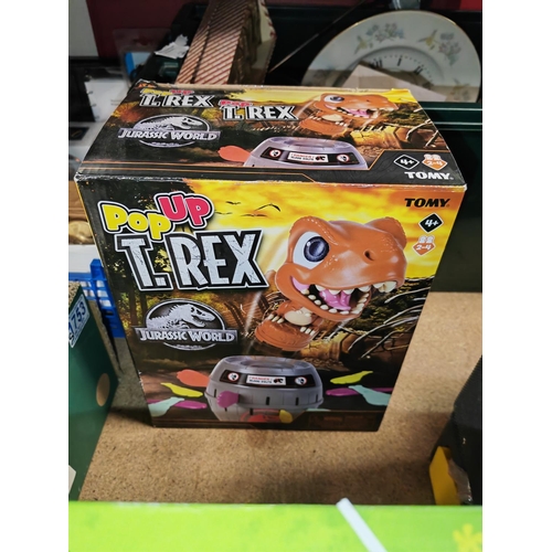 629 - Pop Up T-Rex Jurassic Park Toy And Hungry Hippo Game