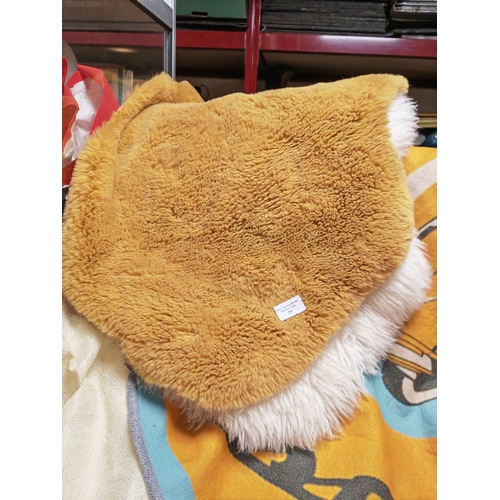 29 - 2 Small Fur Rugs