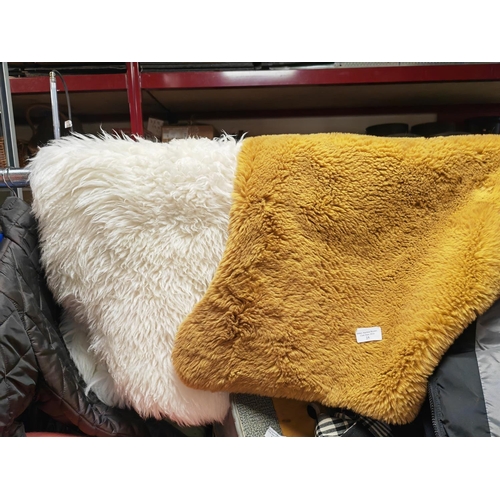 25 - 2 Small Fur Rugs