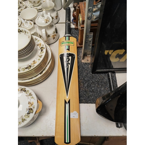 506 - The Magnum Duncan Feardey Cricket Signed Bat