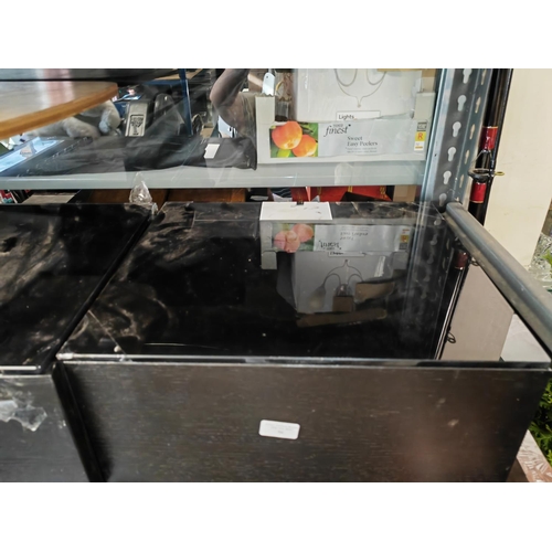 86 - 2 Black Glass Topped Bedside Tables