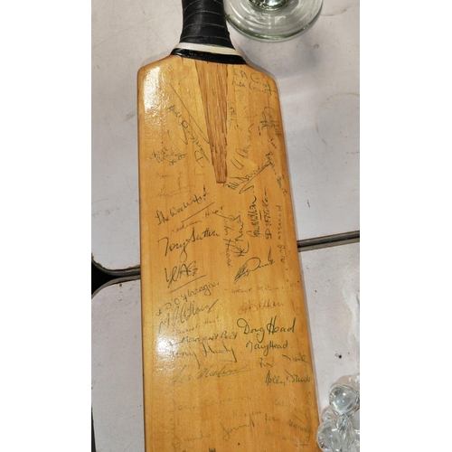 710 - The Magnum Duncan Feardey Cricket Signed Bat