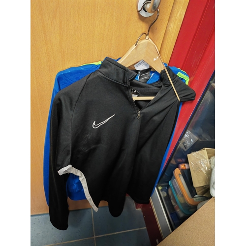 23 - 2 Nike/Adidas Track Tops