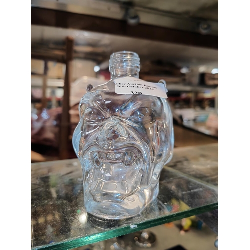 320 - Glass Devils Head Shaped Bottle