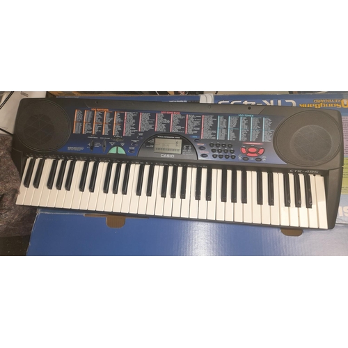 39 - Casio Stk-495 Electronic Keyboard In Box No Power Lead But Tested With Batteries Everything Seems To... 