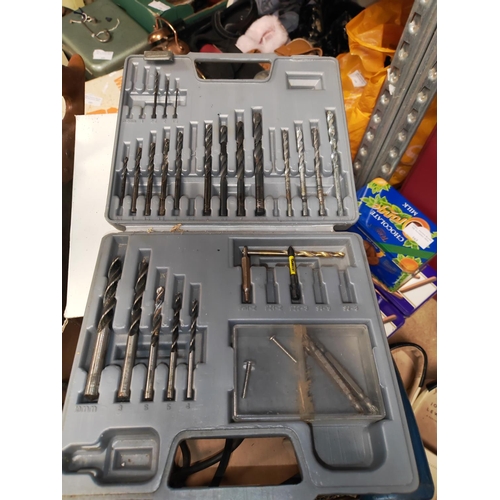 134 - Bosch Electric Drill Plus Drill Bits Plus A Saw Plus Screws Etc