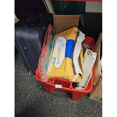 176 - Box Of Mixed Items Including A Pack Of Incontinence Pads + Pull Along Suitcase