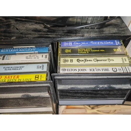 718 - 6 Draw Cassette Storage Unit With Cassettes And A Kindo Vhs Rewinder