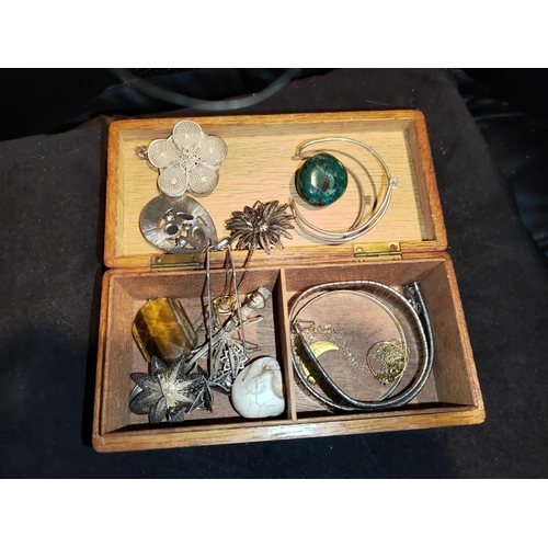 290 - Oak Box Of Jewellery With Some Low Grade Silver Brooches, Skull Etc