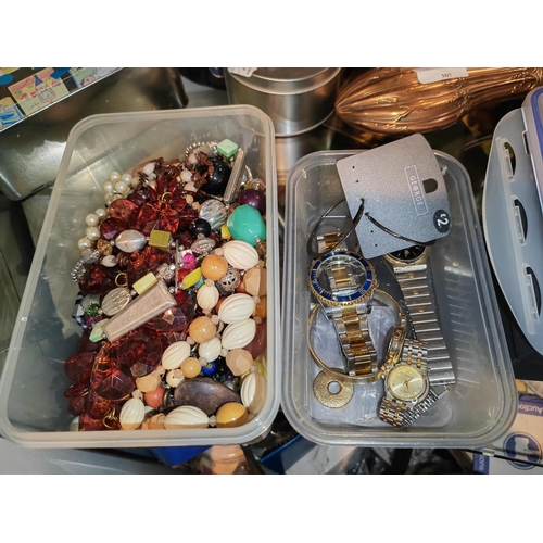 311 - Tin And A Tub Of Costume Jewellery