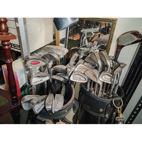 54 - 2 Bags Of Golf Clubs