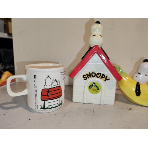 185 - 2 Snoopy Money Boxes Plus 2 Mugs One Mug Chipped